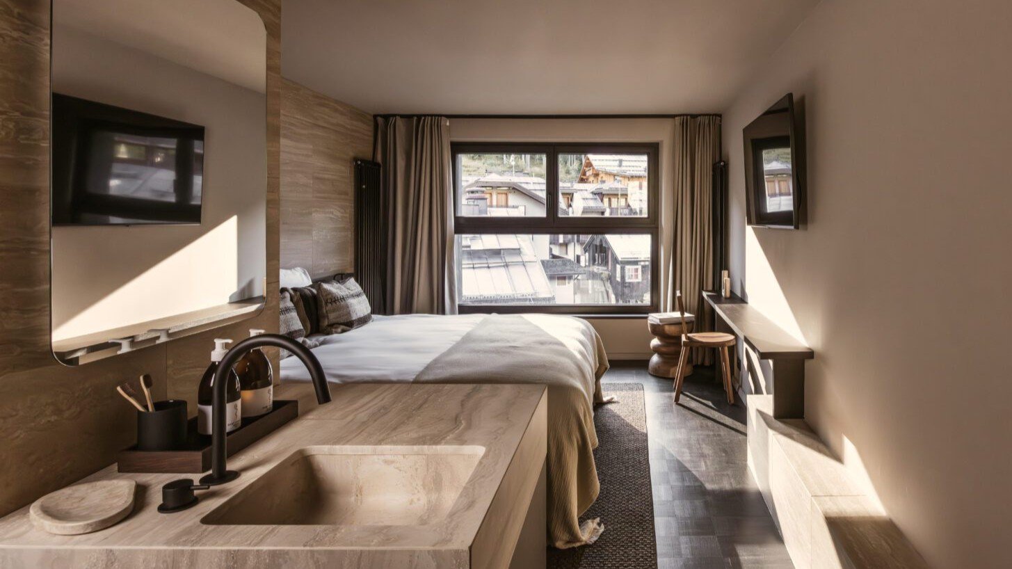Modern gestaltetes Zimmer im Casa Cook Madonna in Südtirol | © Casa Cook